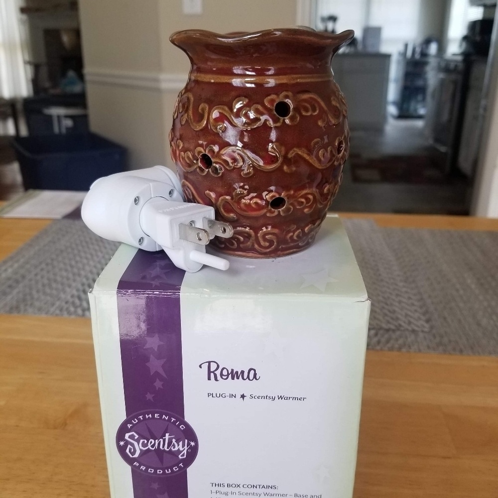 NIB Authentic plug in Candle Warmer